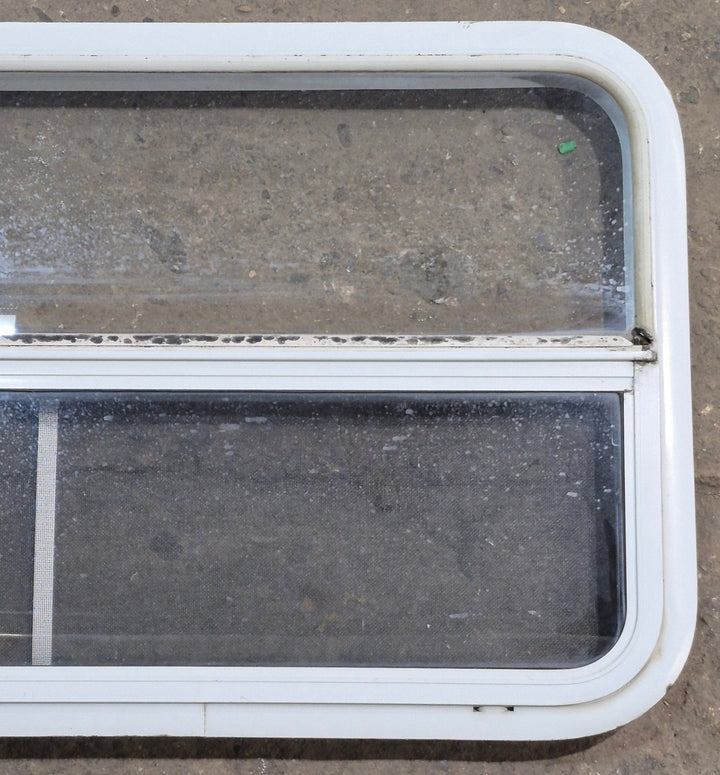 Used White Radius Opening Window : 41 1/4" W x 21 1/4" H x 1 7/8" D - Young Farts RV Parts