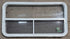 Used White Radius Opening Window : 41 1/4" W x 21 1/4" H x 1 7/8" D - Young Farts RV Parts