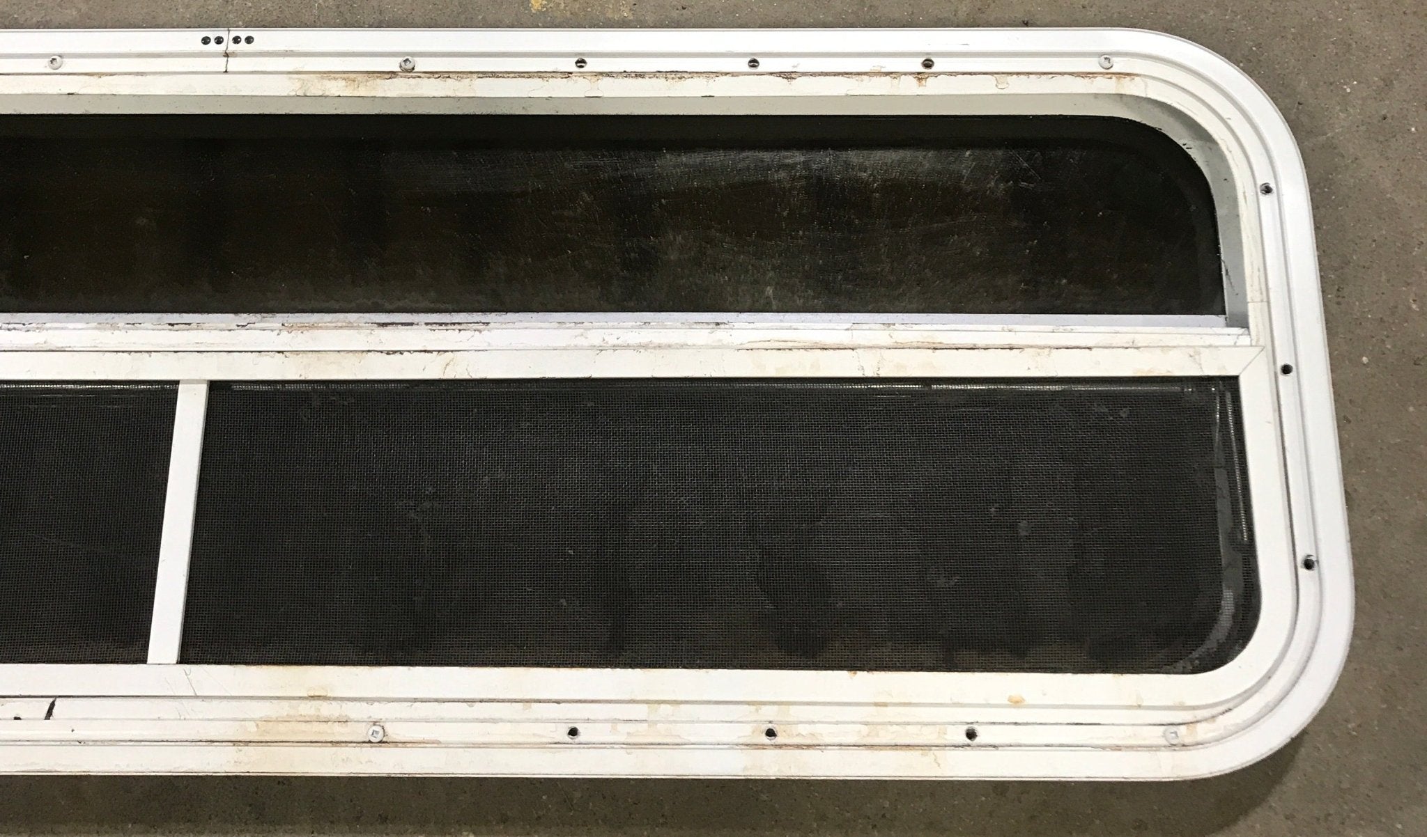 Used White Radius Opening Window : 47 1/2" W x 14 1/2" H x 1 7/8" D - Young Farts RV Parts