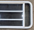 Used White Radius Opening Window : 47 1/4" W x 21 1/4" H x 1 7/8" D - Young Farts RV Parts