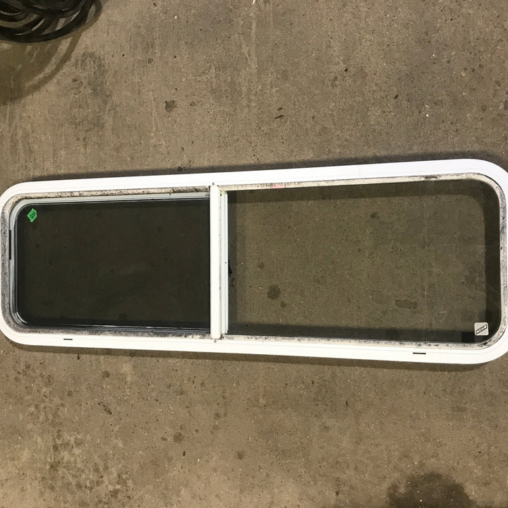 Used White Radius Opening Window : 48" W x 14 3/4" H x 1 7/8" D - Young Farts RV Parts