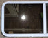 Used White Radius Opening Window : 54 1/4" W x 21 3/4" H x 1 7/8" D - Young Farts RV Parts