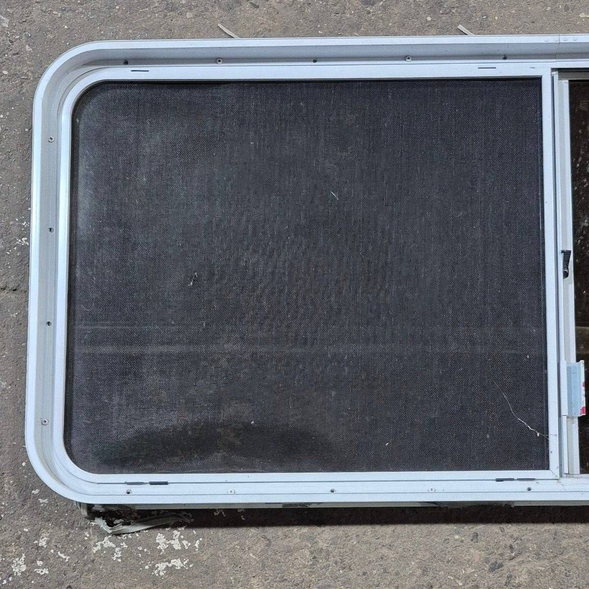Used White Radius Opening Window - 57 1/4" X 24 1/2" X 2" - Young Farts RV Parts