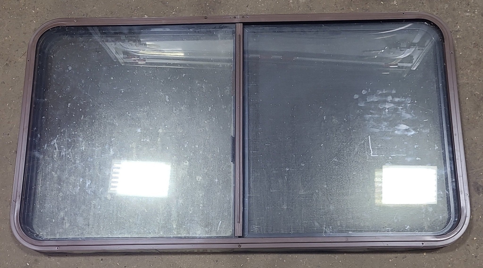Black Radius Opening Window : 48 3/4" W x 26 1/2" H x 1 7/8" D - Young Farts RV Parts
