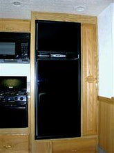Load image into Gallery viewer, Refrigerator Door Panel FRV Inc. 9TP-L Fits Norcold Refrigerators; Upper Door Panels; Black - Young Farts RV Parts
