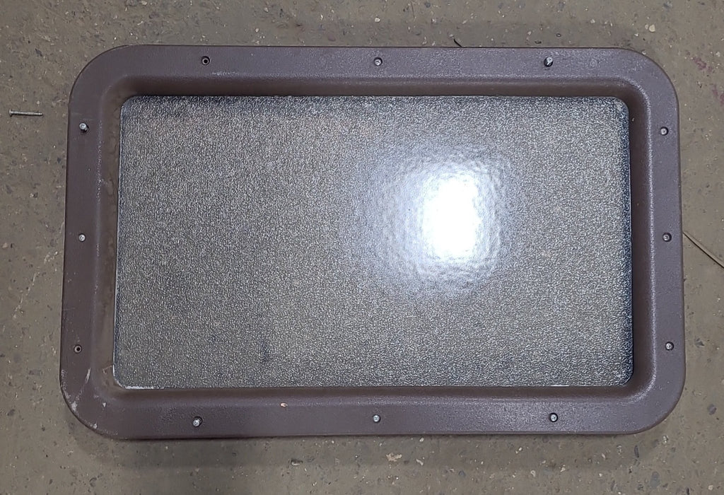 Used Black/ Brown Entry door window : 24 3/4" x 15 3/4" - Young Farts RV Parts