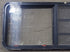 Used Black Radius Emergency Opening Window : 21 3/4" W x 59 3/4" H x 1 1/4" D - Young Farts RV Parts