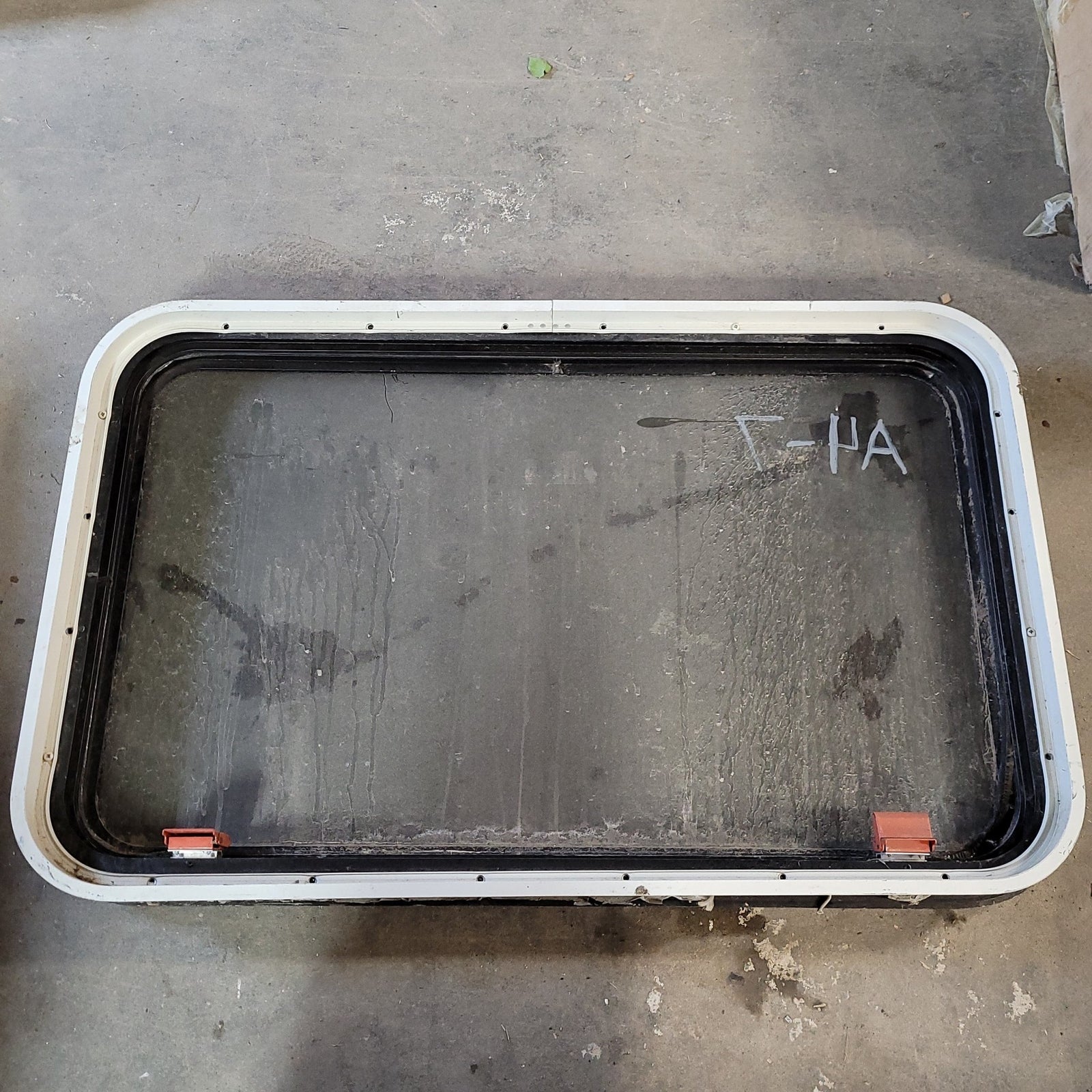 Used Black Radius Emergency Opening Window : 21 3/4 X 35 1/2 X 2