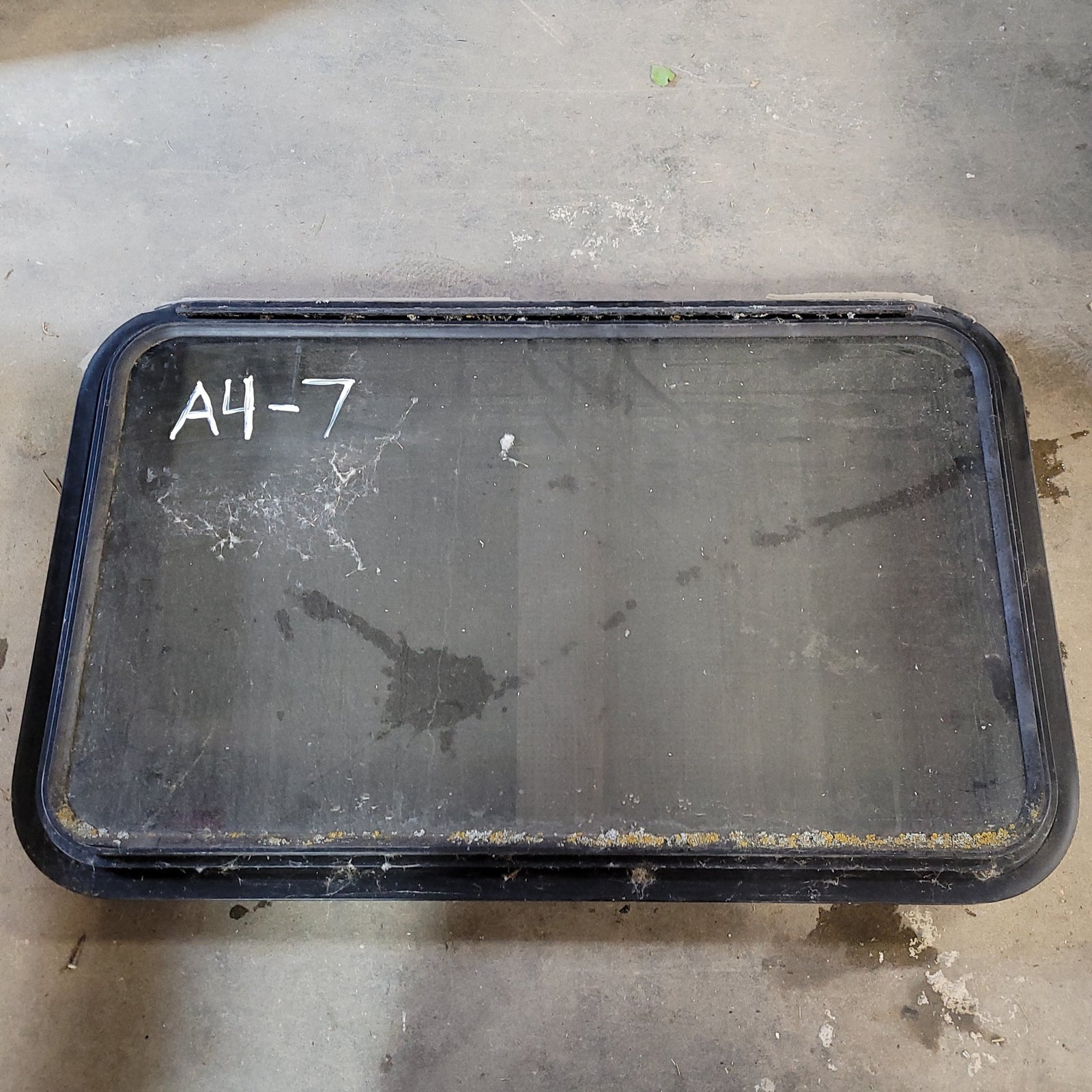Used Black Radius Emergency Opening Window : 21 3/4 X 35 1/2 X 2