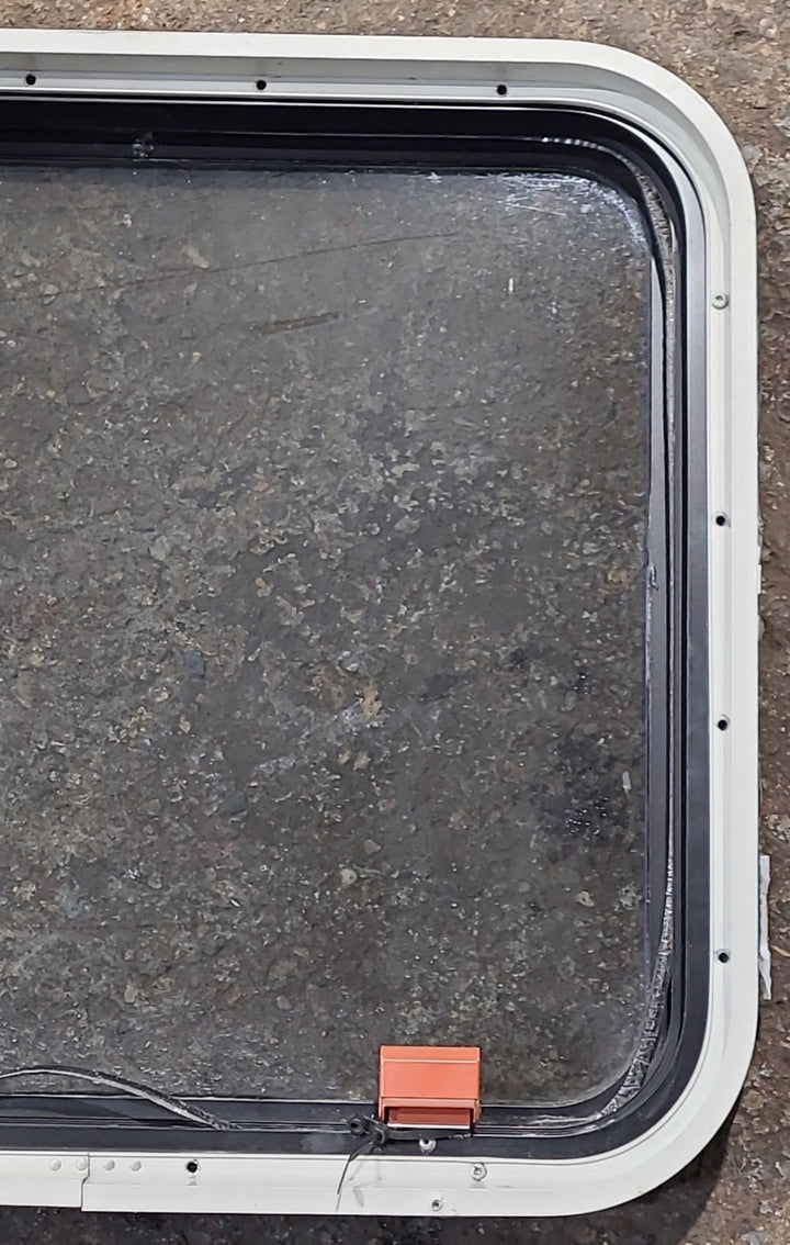 Used Black Radius Emergency Opening Window : 23 1/2" W x 21 3/4" H x 1 3/4" D - Young Farts RV Parts