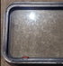 Used Black Radius Emergency Opening Window : 35 1/2" W x 18 3/4" H x 1 3/4" D - Young Farts RV Parts