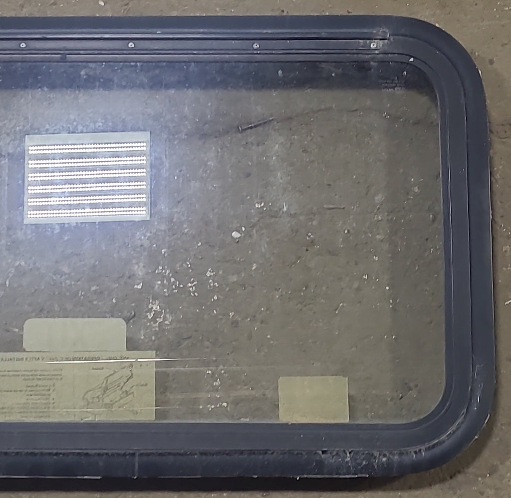 Used Black Radius Emergency Opening Window : 35 1/2" W X 18 3/4" H X 1 3/4" D - Young Farts RV Parts