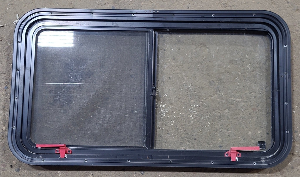 Used Black Radius Emergency Opening Window : 35 1/2" W x 19 1/2" H x 1 1/8" D - Young Farts RV Parts