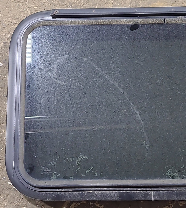 Used Black Radius Emergency Opening Window : 35 1/2" W x 19" H x 1 7/8" D - Young Farts RV Parts