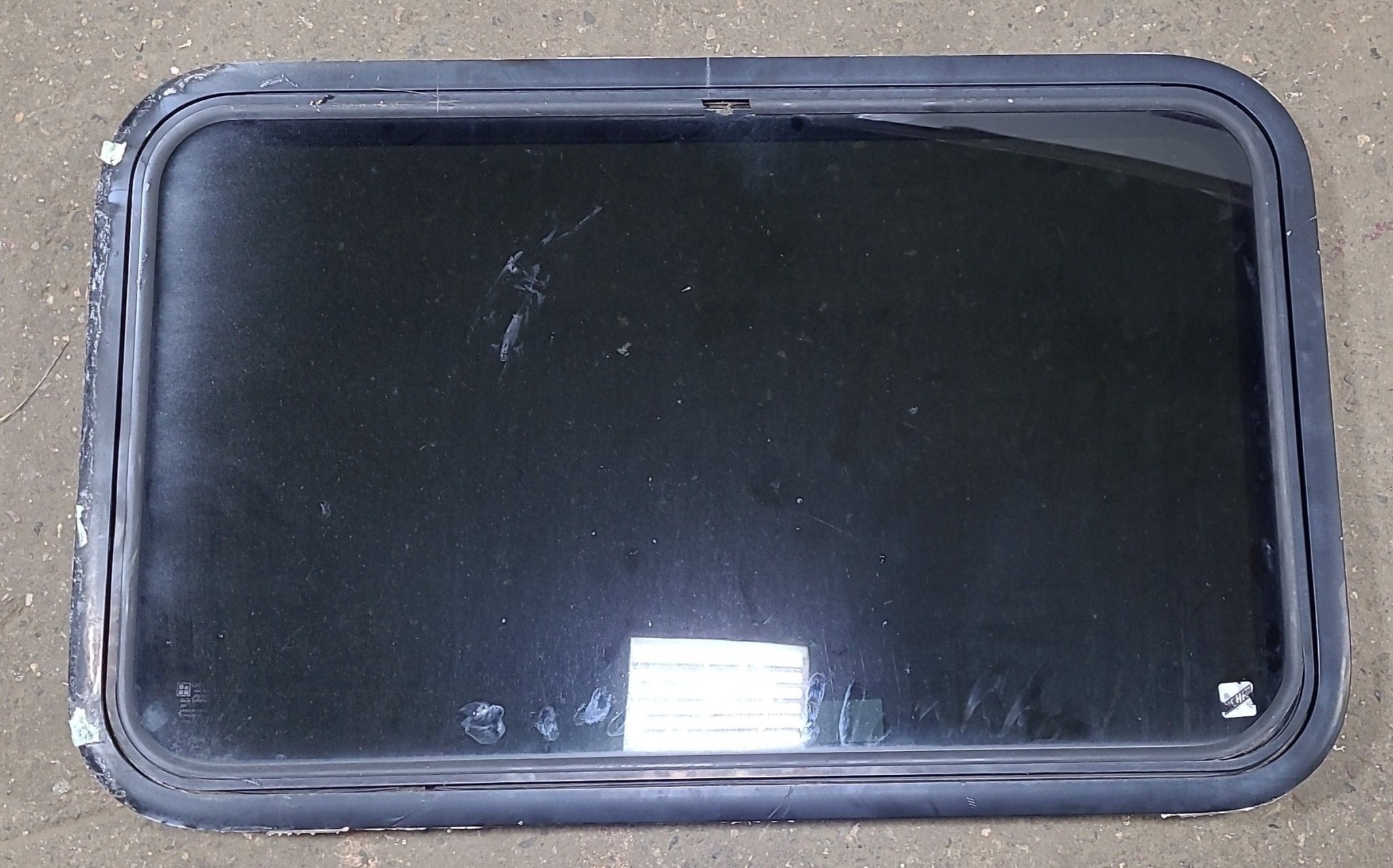 Used Black Radius Emergency Opening Window : 35 1/2" W x 21 1/2" H x 1 1/4" D - Young Farts RV Parts