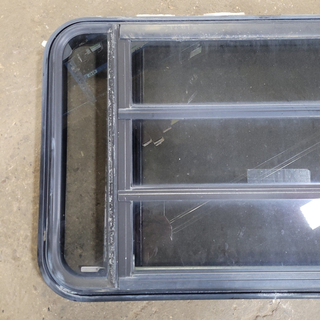 Used Black Radius Emergency Opening Window : 35 1/4" W X 21 1/2" H X 1 7/8" D - Young Farts RV Parts