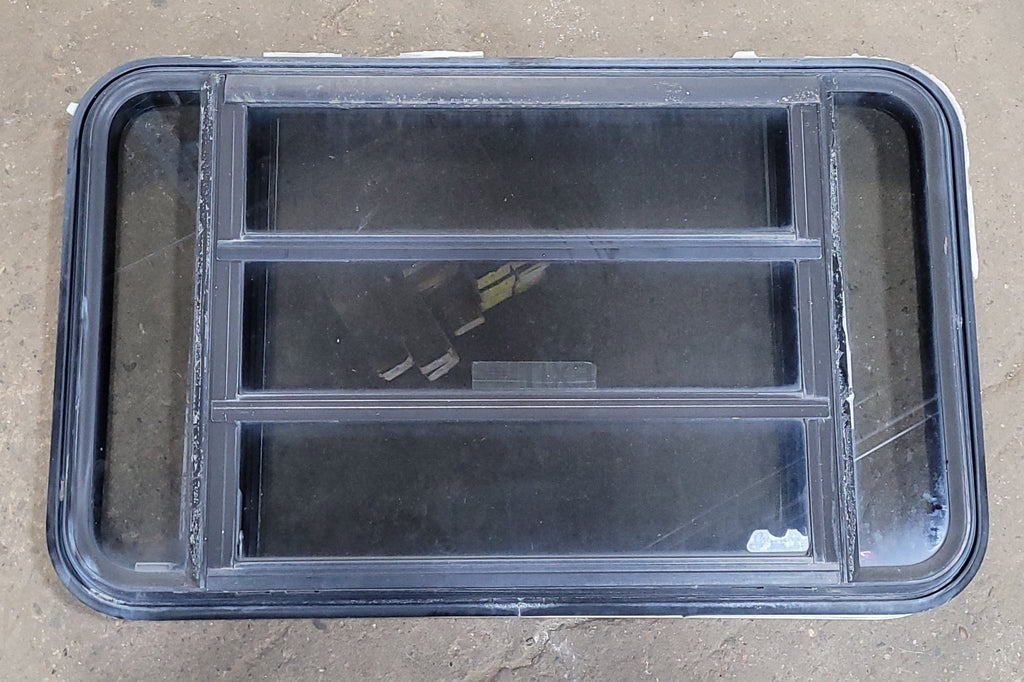 Used Black Radius Emergency Opening Window : 35 1/4" W X 21 1/2" H X 1 7/8" D - Young Farts RV Parts