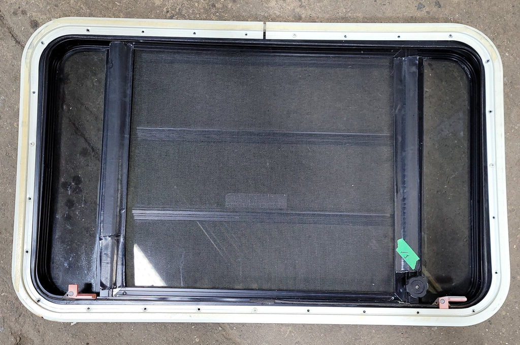 Used Black Radius Emergency Opening Window : 35 1/4" W X 21 1/2" H X 1 7/8" D - Young Farts RV Parts