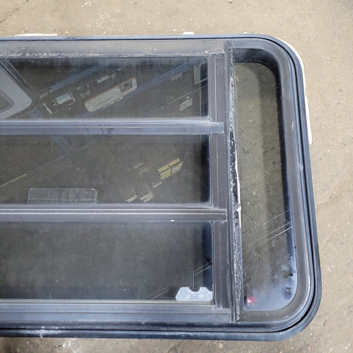 Used Black Radius Emergency Opening Window : 35 1/4" W X 21 1/2" H X 1 7/8" D - Young Farts RV Parts