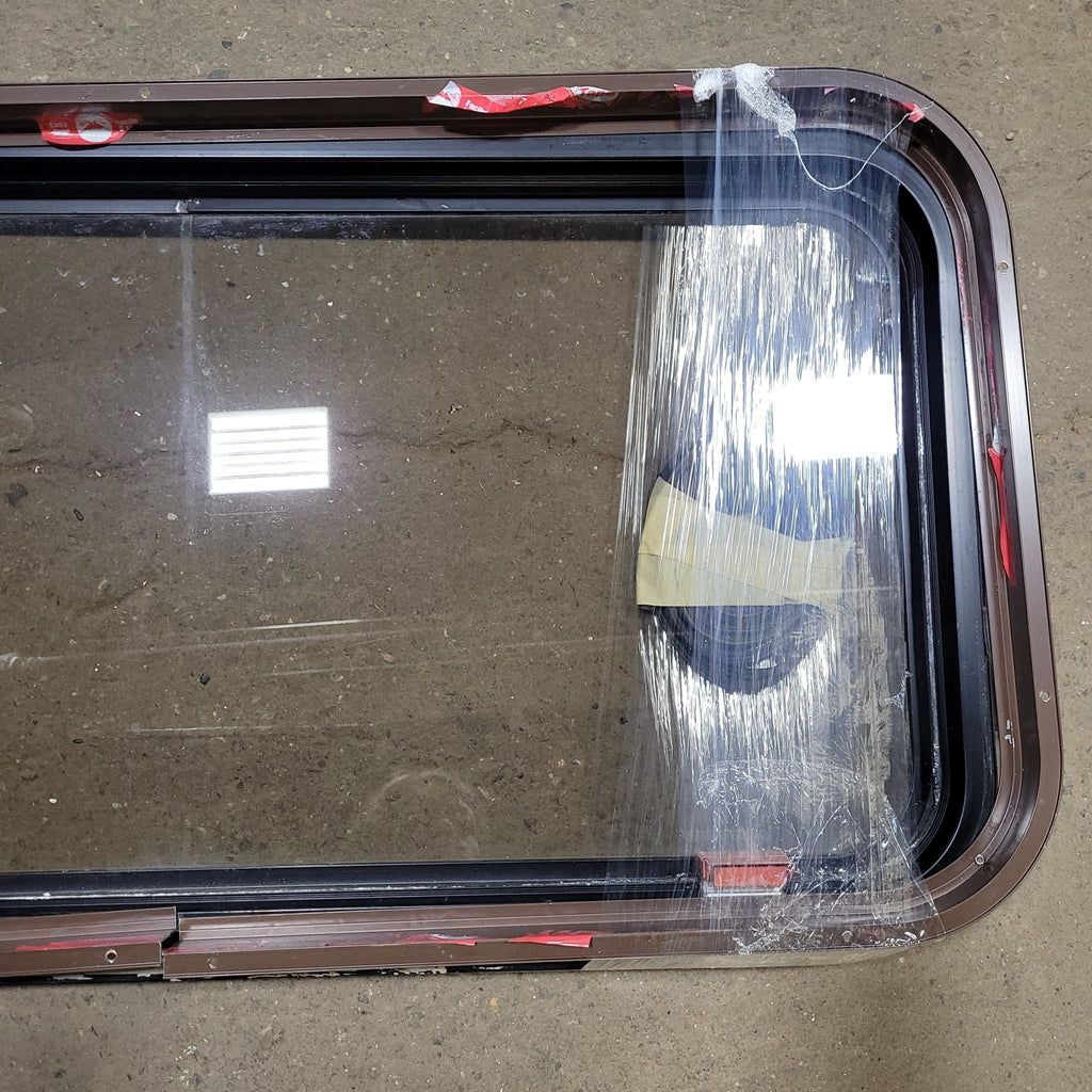 Used Black Radius Emergency Opening Window : 35 5/8" W X 17 3/4" H X 2" D - Young Farts RV Parts