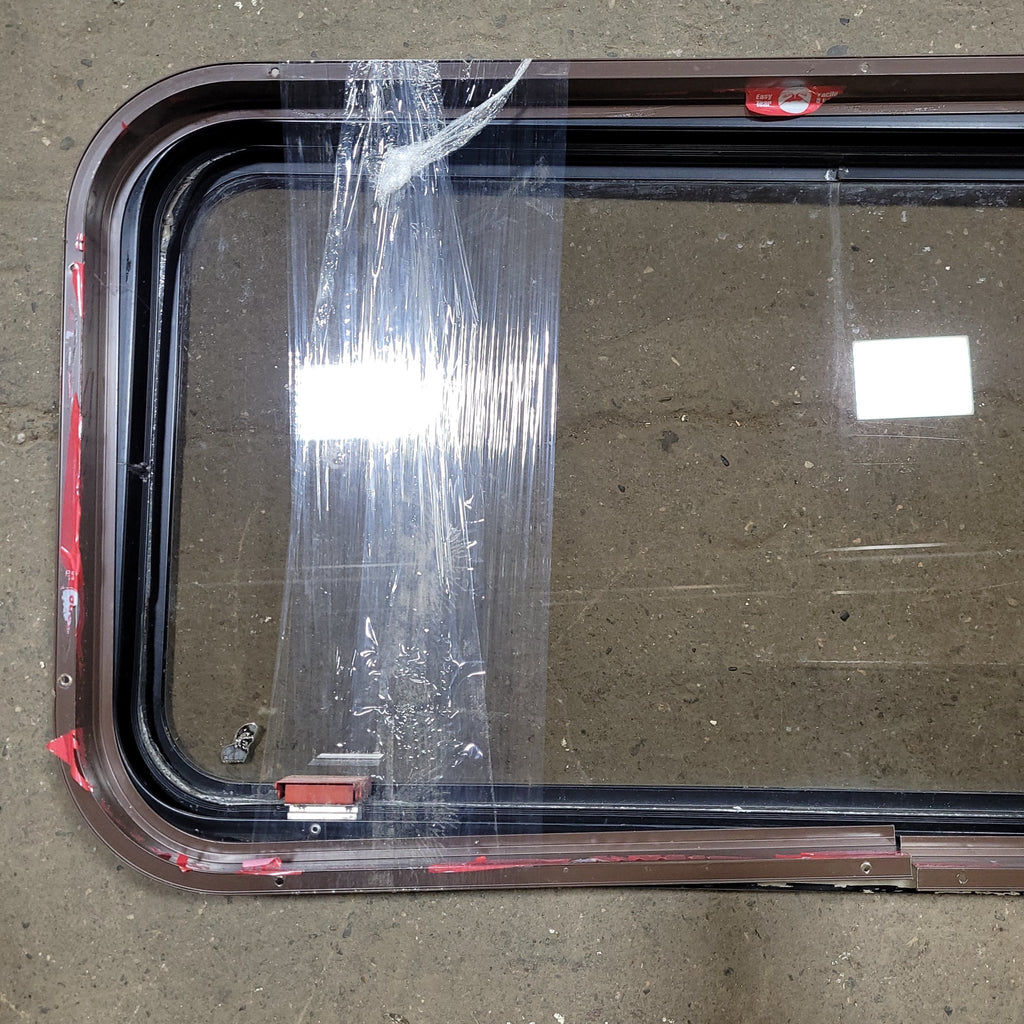 Used Black Radius Emergency Opening Window : 35 5/8" W X 17 3/4" H X 2" D - Young Farts RV Parts