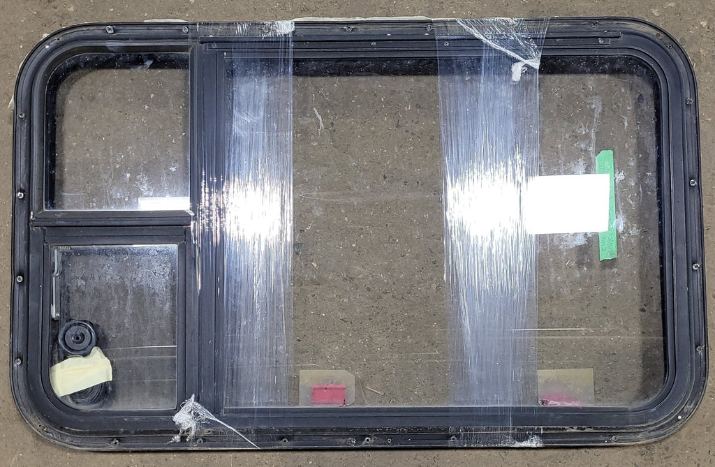 Used Black Radius Emergency Opening Window : 35 5/8" W X 21 1/2" H X 2" D - Young Farts RV Parts