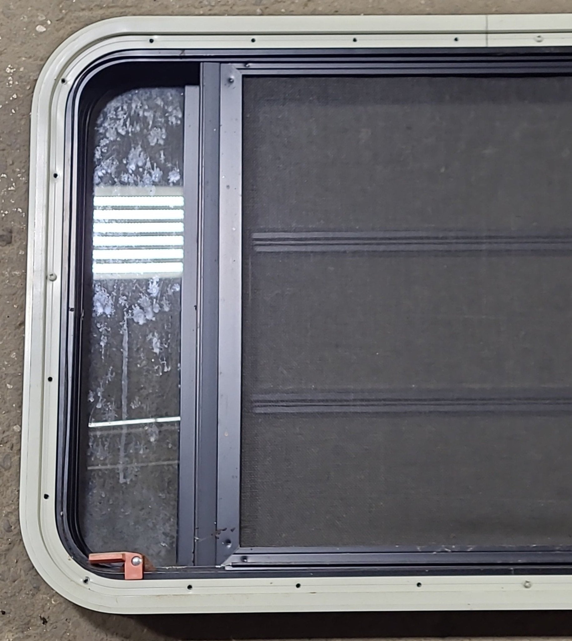 Used Black Radius Emergency Opening Window : 35" W x 21 1/4" H x 1 3/4" D - Young Farts RV Parts