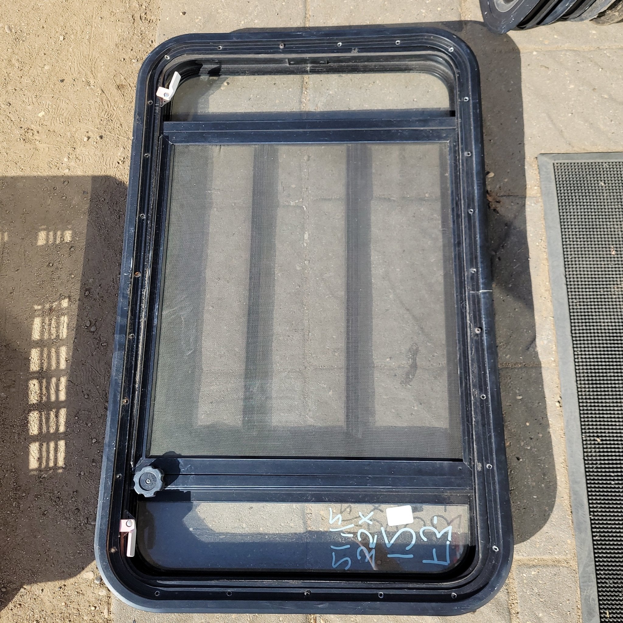 Used Black Radius Emergency Opening Window : 35 X 21 1/2 X 2" D - Young Farts RV Parts