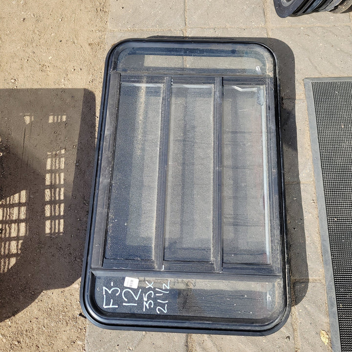 Used Black Radius Emergency Opening Window : 35 X 21 1/2 X 2" D - Young Farts RV Parts