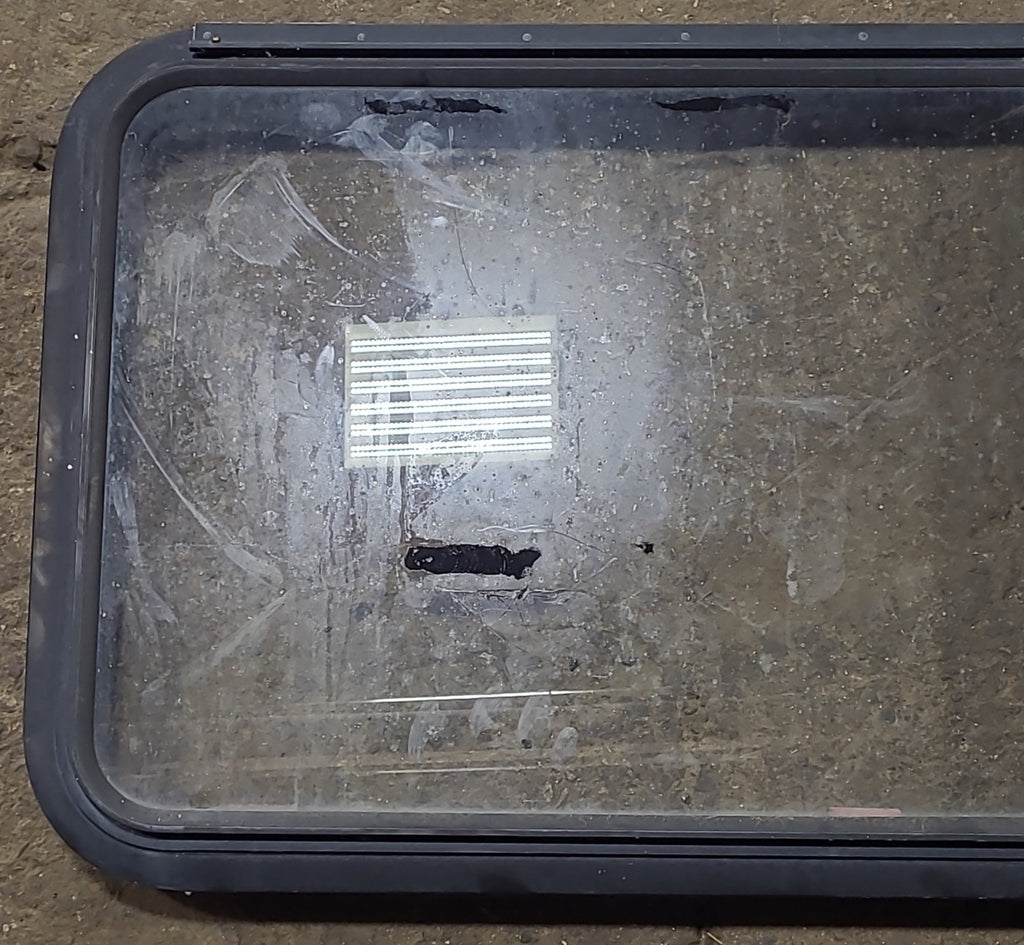 Used Black Radius Emergency Opening Window : 41 3/8" W x 21 5/8" H x 1 7/8" D - Young Farts RV Parts