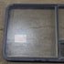 Used Black Radius Emergency Opening Window : 41 3/8" W x 28 5/8" H x 1 7/8" D - Young Farts RV Parts