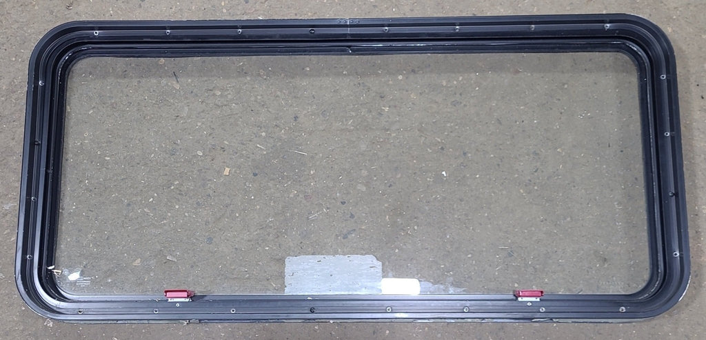 Used Black Radius Emergency Opening Window : 48 1/2" W x 21 3/4" H x 1 3/4" D - Young Farts RV Parts