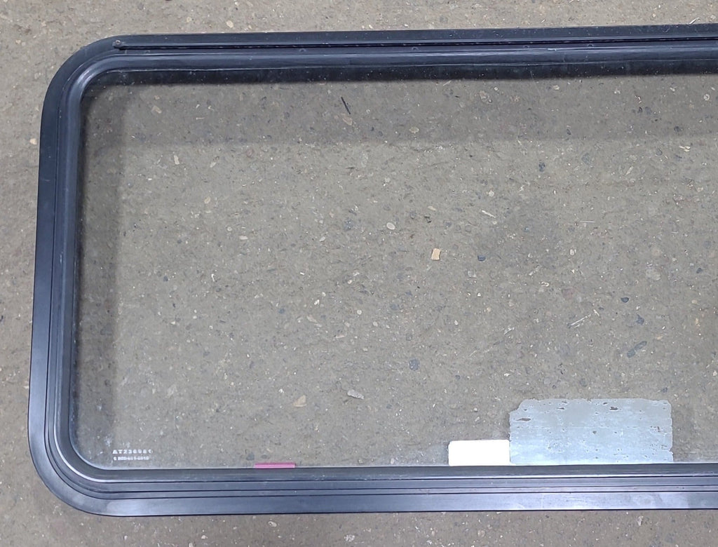 Used Black Radius Emergency Opening Window : 48 1/2" W x 21 3/4" H x 1 3/4" D - Young Farts RV Parts