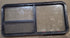 Used Black Radius Emergency Opening Window : 53 1/2" W x 25 1/2" H x 1 7/8" D - Young Farts RV Parts