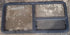 Used Black Radius Emergency Opening Window : 53 1/2" W x 25 1/2" H x 1 7/8" D - Young Farts RV Parts