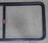 Used Black Radius Emergency Opening Window : 55 1/2" W x 25 1/2" H x 1 7/8" D - Young Farts RV Parts