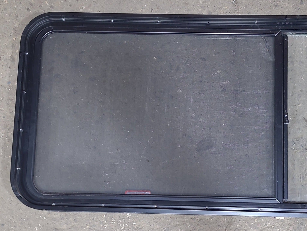 Used Black Radius Emergency Opening Window : 60 3/8" W x 21 3/4" H x 1 3/4" D - Young Farts RV Parts