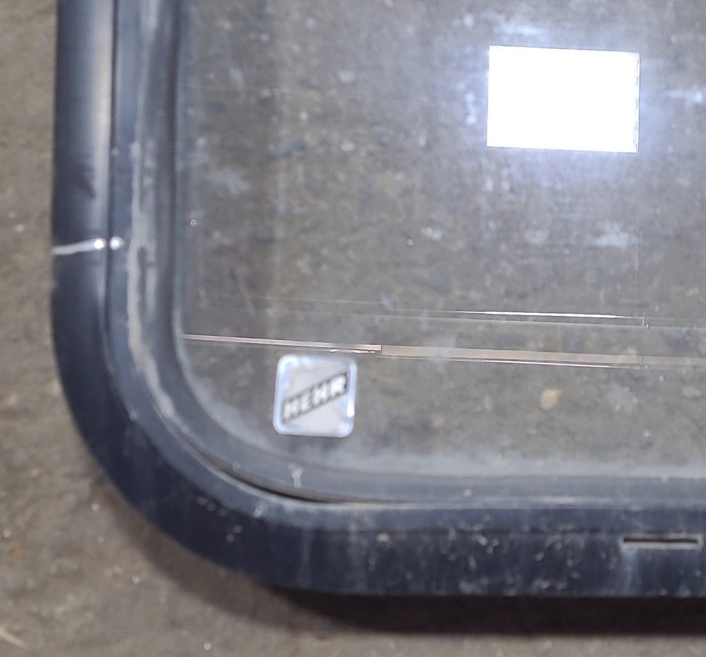 Used Black Radius Emergency Opening Window : 60 3/8" W x 21 3/4" H x 1 3/4" D - Young Farts RV Parts