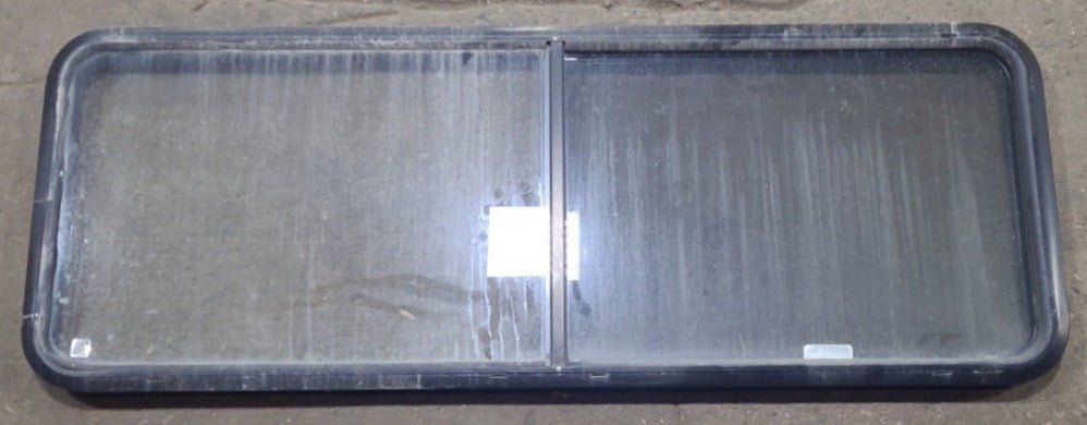 Used Black Radius Emergency Opening Window : 60 3/8" W x 21 3/4" H x 1 3/4" D - Young Farts RV Parts