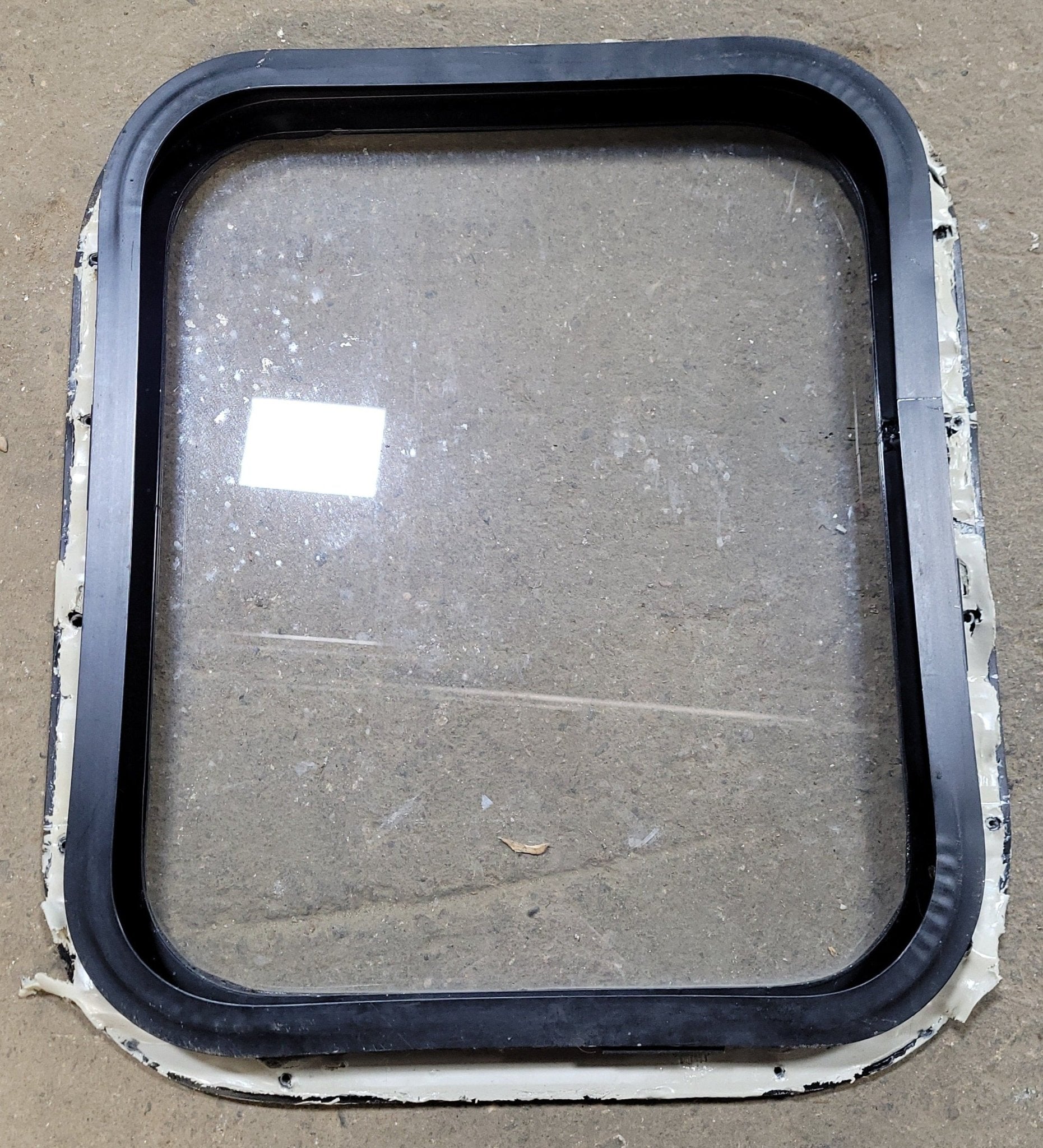 Used Black Radius Non-Opening Window : 16 3/4" W X 19 3/4" H X 1 1/2" D - Young Farts RV Parts