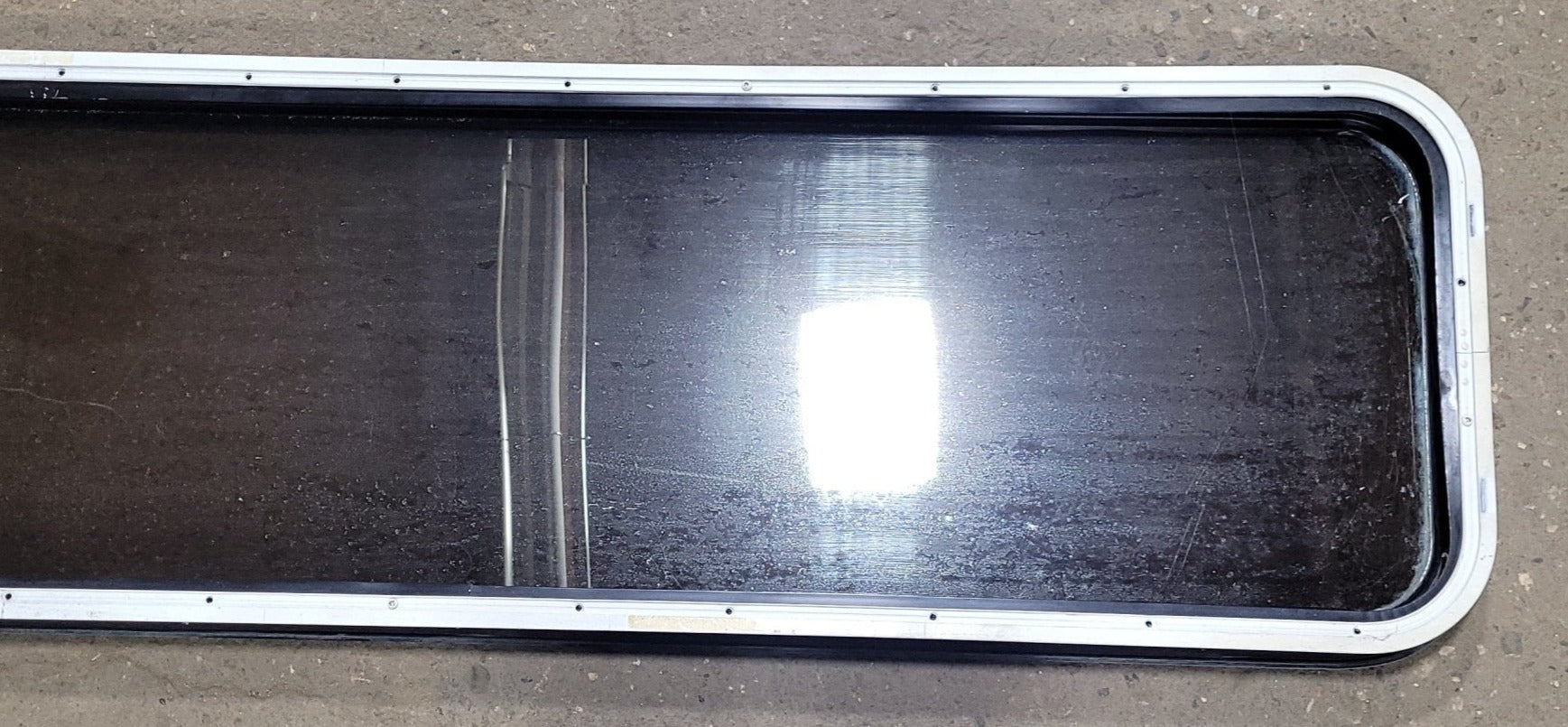 Used Black Radius Non-Opening Window : 16 3/4" W X 59 1/2" H X 1 7/8" D - Young Farts RV Parts