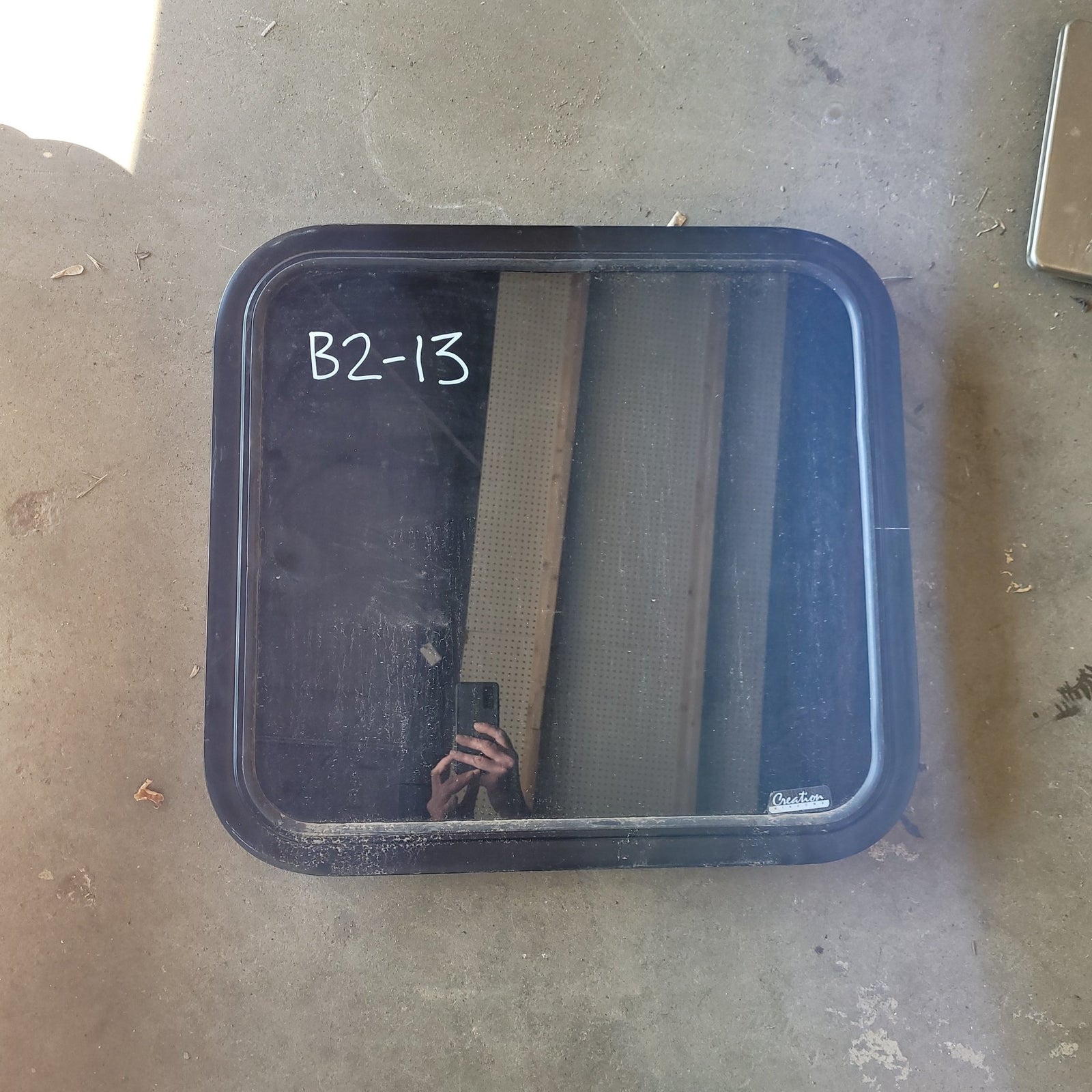 Used Black Radius Non-Opening Window : 23 1/2 X 21 1/2 X 2