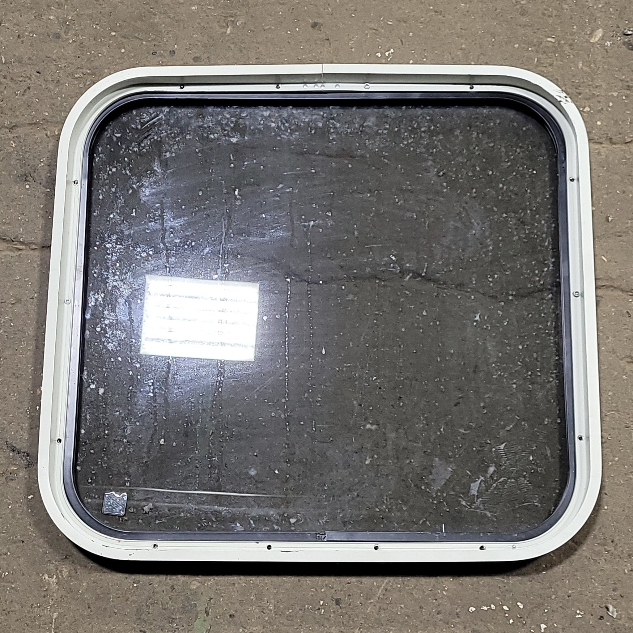 Used Black Radius Non-Opening Window : 23 1/4" W X 21 3/4" H X 1 3/8" D - Young Farts RV Parts