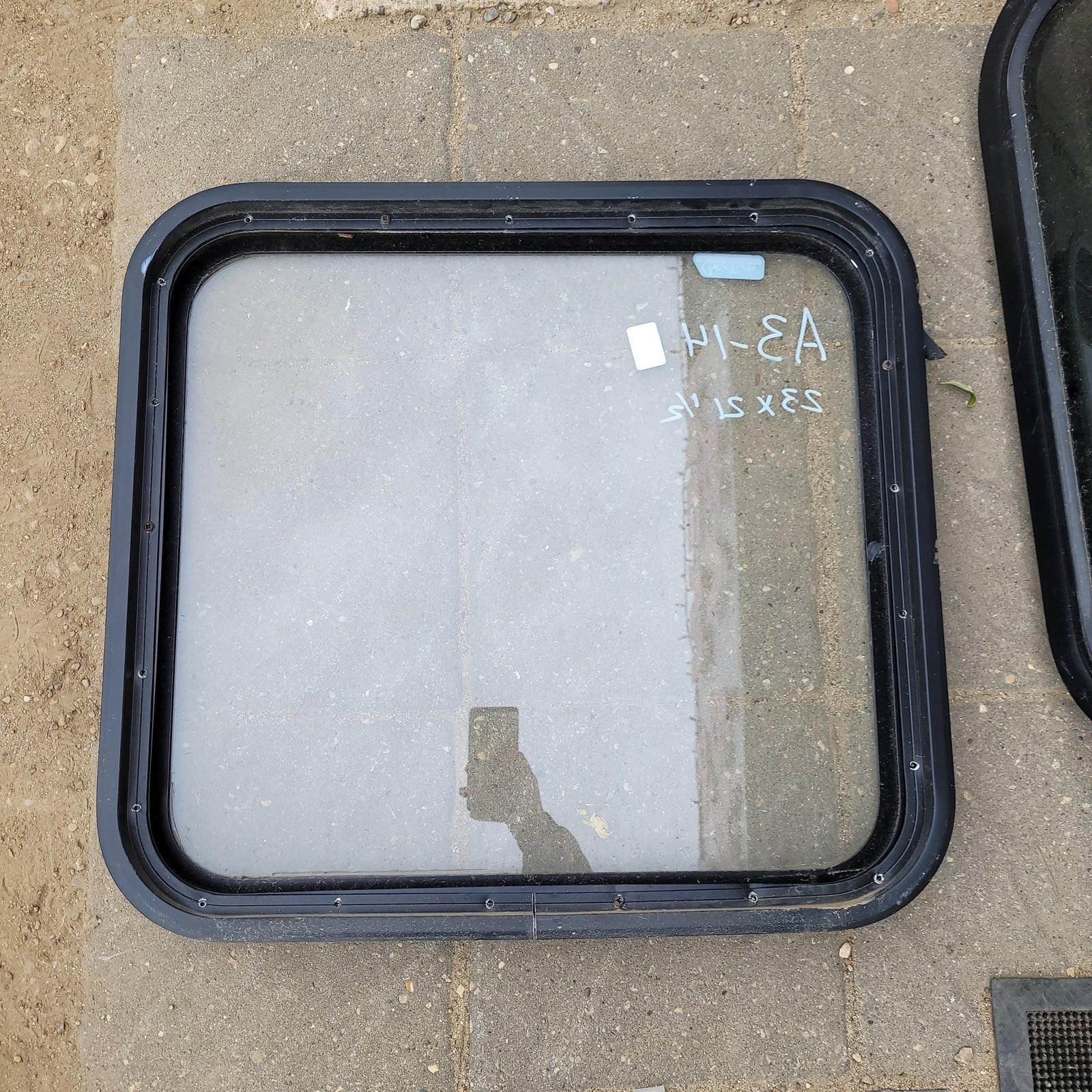 Used Black Radius Non-Opening Window : 23 X 21 1/2 X 2