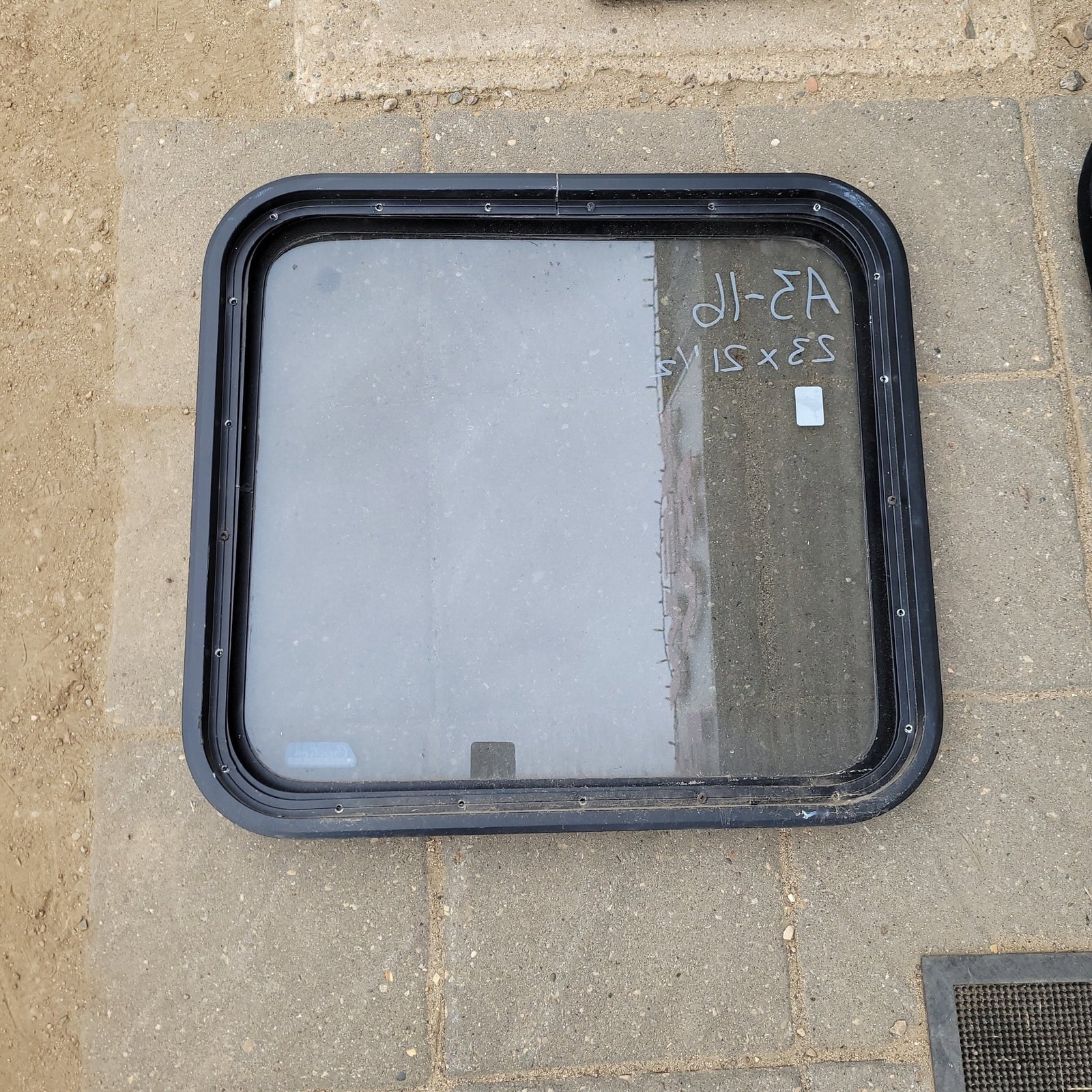 Used Black Radius Non-Opening Window : 23 X 21 1/2 X 2