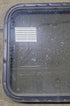 Used Black Radius Non Opening Window : 24 1/2" W x 23" H x 1 1/2" D - Young Farts RV Parts