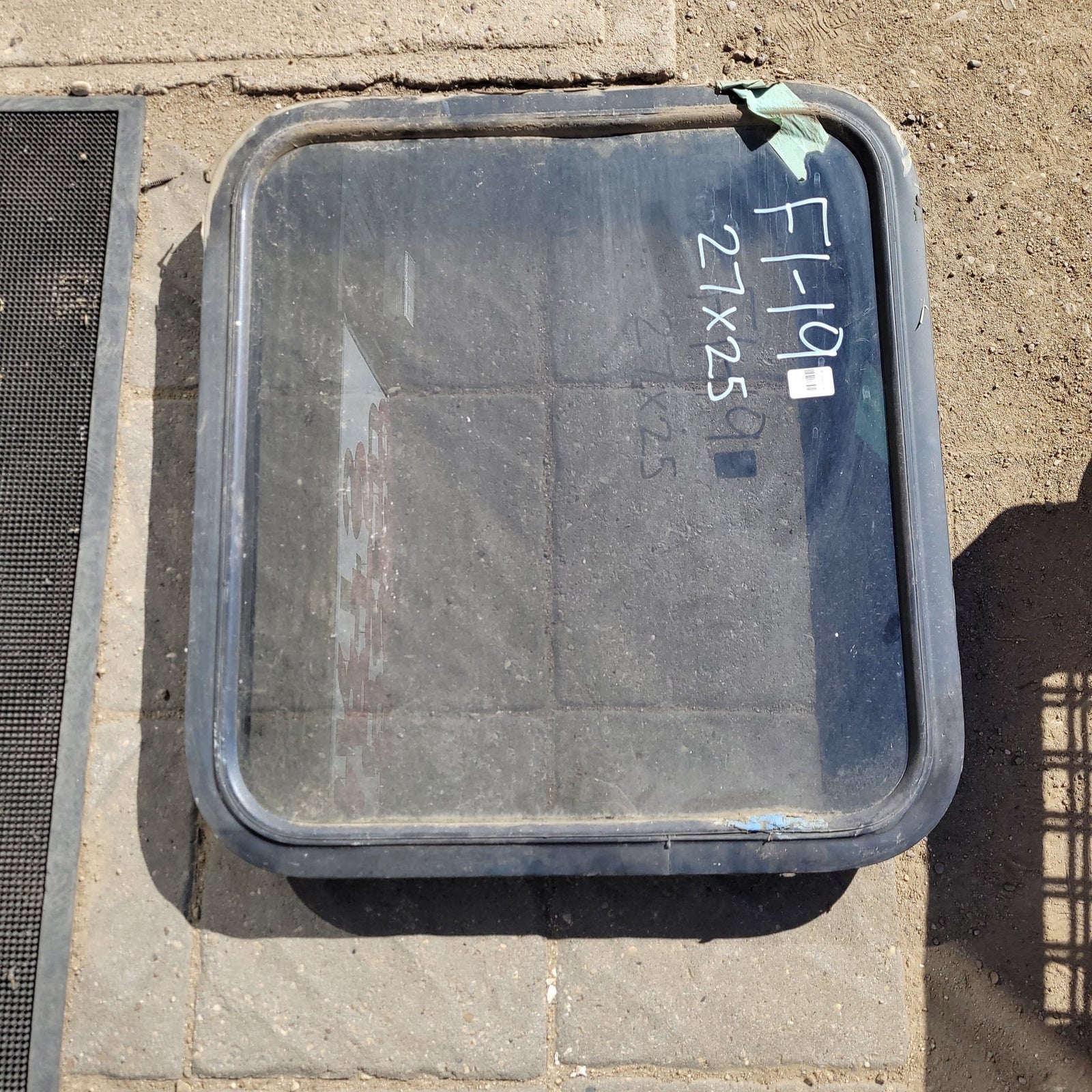 Used Black Radius Non-Opening Window : 27 X 25 X 2