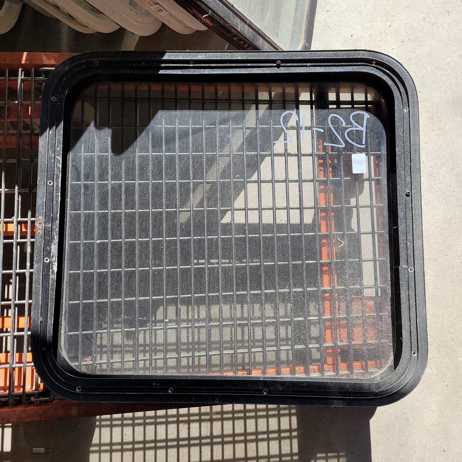 Used Black Radius Non-Opening Window : 27 X 25 X 2