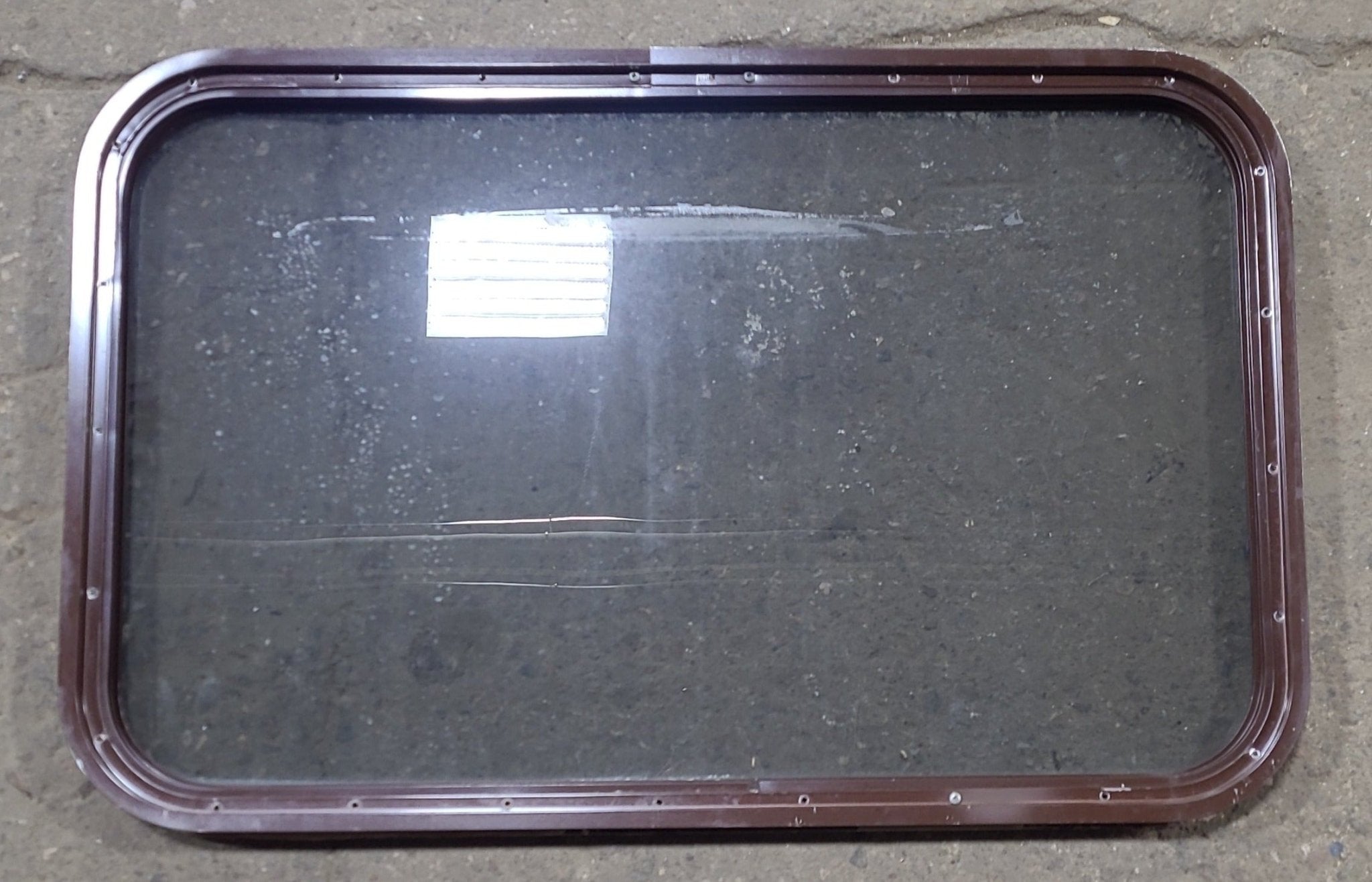 Used Black Radius Non Opening Window : 31 3/4" W x 19 3/4" H x 1 1/4" D - Young Farts RV Parts