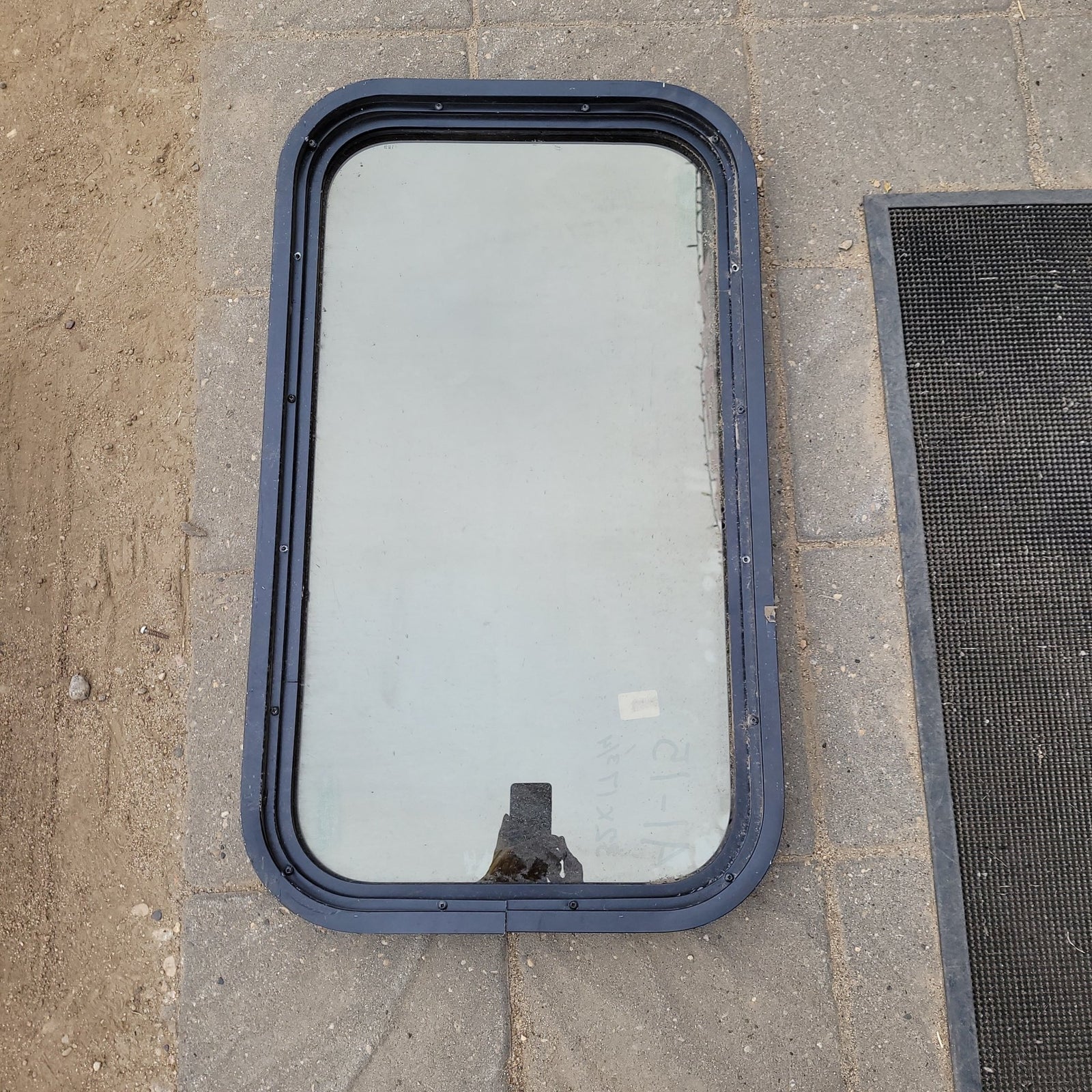 Used Black Radius Non- Opening Window : 32 X 17 1/2 X 2